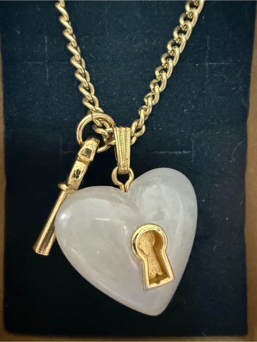 Avon Gold-tone Chain Necklace with faux Rose Quartz Heart Lock Pendant